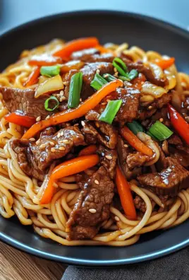 Reisnudeln mit Rindfleisch, Sojasauce und Gemüse